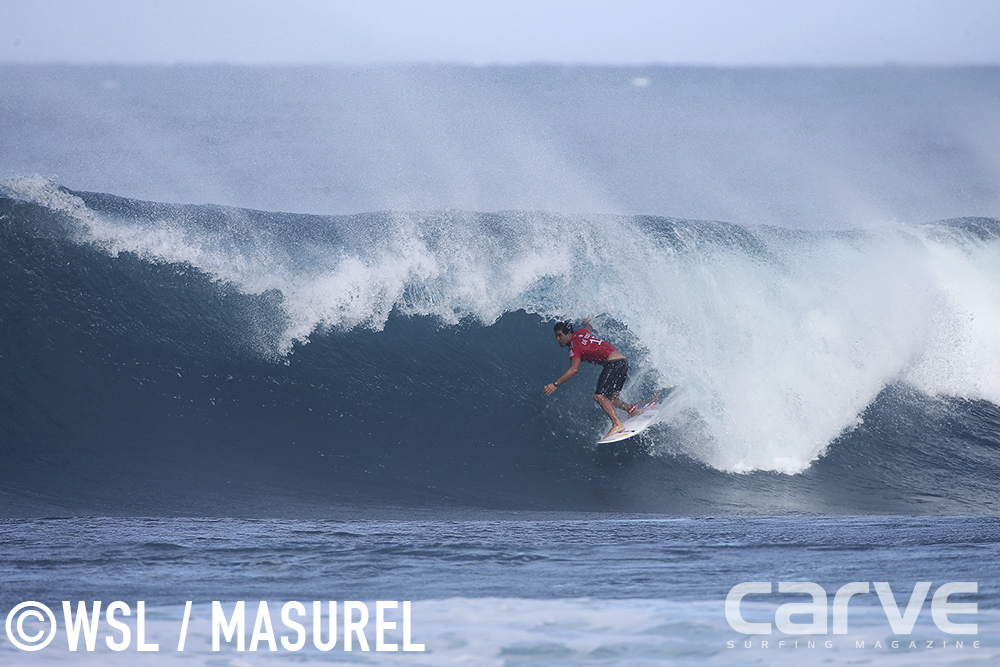 Adriano De Souza of Brasil (pictured) winning his Quarterfinal heat at the Billabong Pipe Masters on Thursday December 17, 2015.