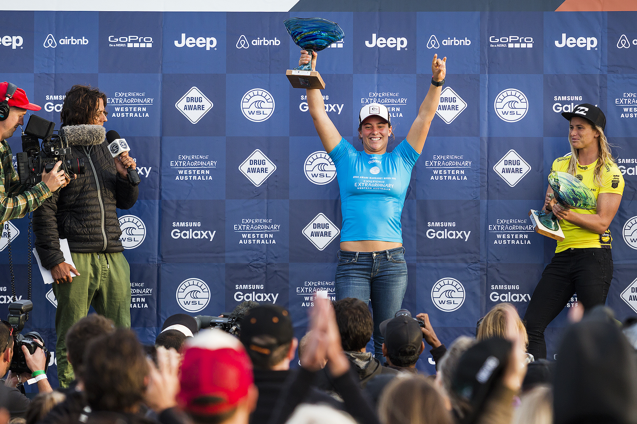 Tyler Wright of Australia (pictured) raises her winners trophy at the Drug Aware Margaret River Pro on Friday April 15, 2016.  PHOTO: © WSL / Cestari SOCIAL: @edsloanephoto @wsl This image is the copyright of  the World Surf League and is provided royalty free for editorial use only, in all media now known or hereafter created. No commercial rights granted. Sale or license of the images is prohibited. This image is a factually accurate rendering of what it depicts and has not been modified or augmented except for standard cropping and toning. ALL RIGHTS RESERVED. placing runner up at the Drug Aware Margaret River Pro in Western Australia.