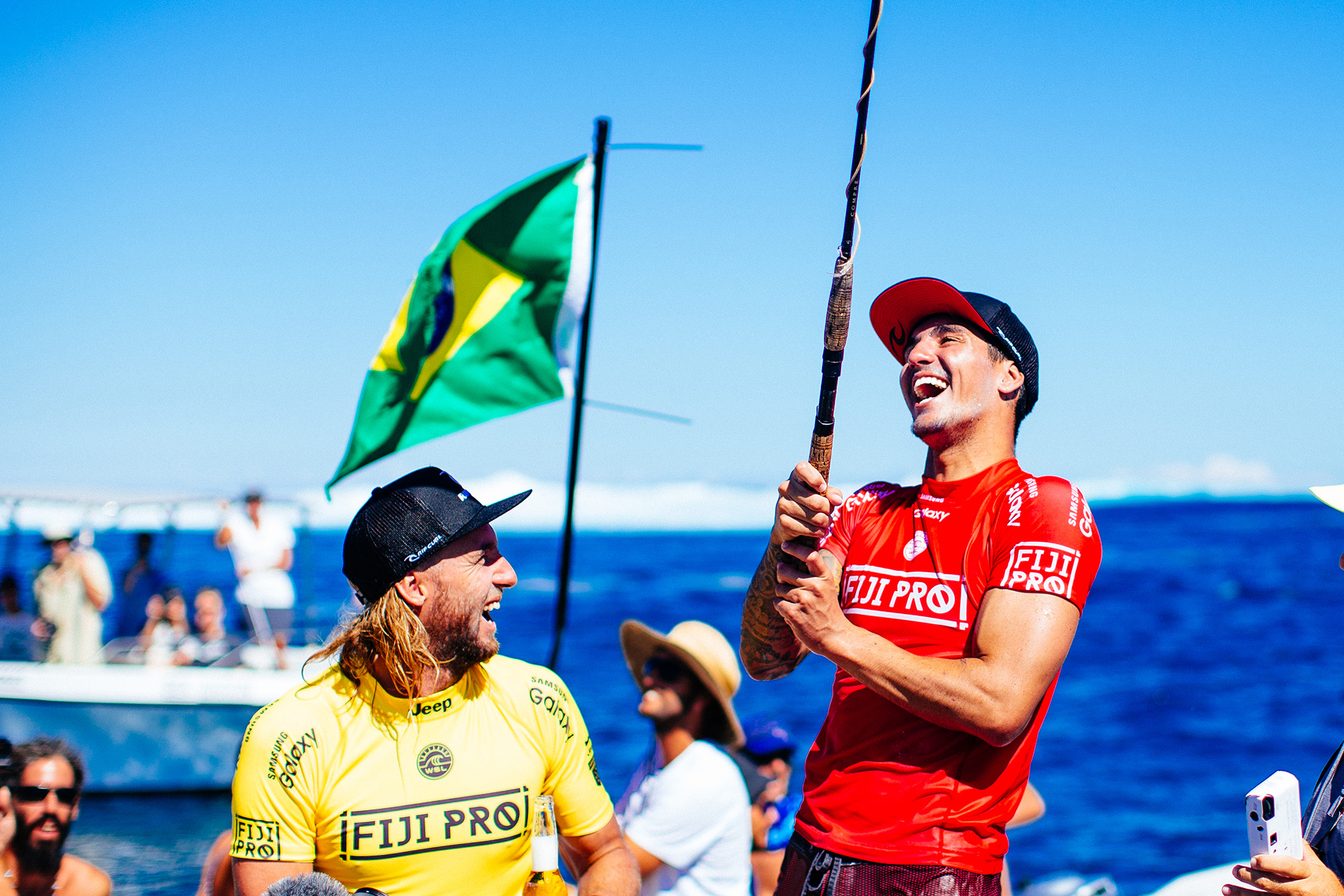 Gabriel Medina of Brasil (pictured) celebrates his victory alongside runner and his opponent Matt Wilkinson of Australia (yellow) at the Fiji Pro at Cloudbreak on Friday June 17, 2016.  PHOTO: © WSL/ Sloane @edsloanephoto This image is the copyright of  the World Surf League and is provided royalty free for editorial use only, in all media now known or hereafter created. No commercial rights granted. Sale or license of the images is prohibited. This image is a factually accurate rendering of what it depicts and has not been modified or augmented except for standard cropping and toning. ALL RIGHTS RESERVED.