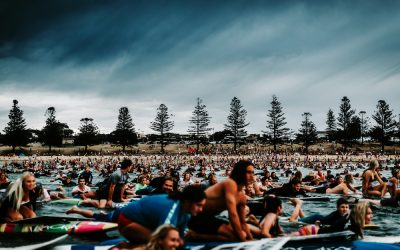 Thousands of surfers paddle out to protest Norwegian oil drilling in Aus