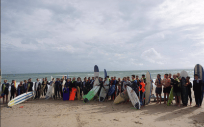 South Coast surfers paddle out in memory of Chris James and raise £1,209 for charity