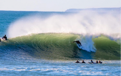Surfers say raw sewage in the sea off Porthleven is making them ill.
