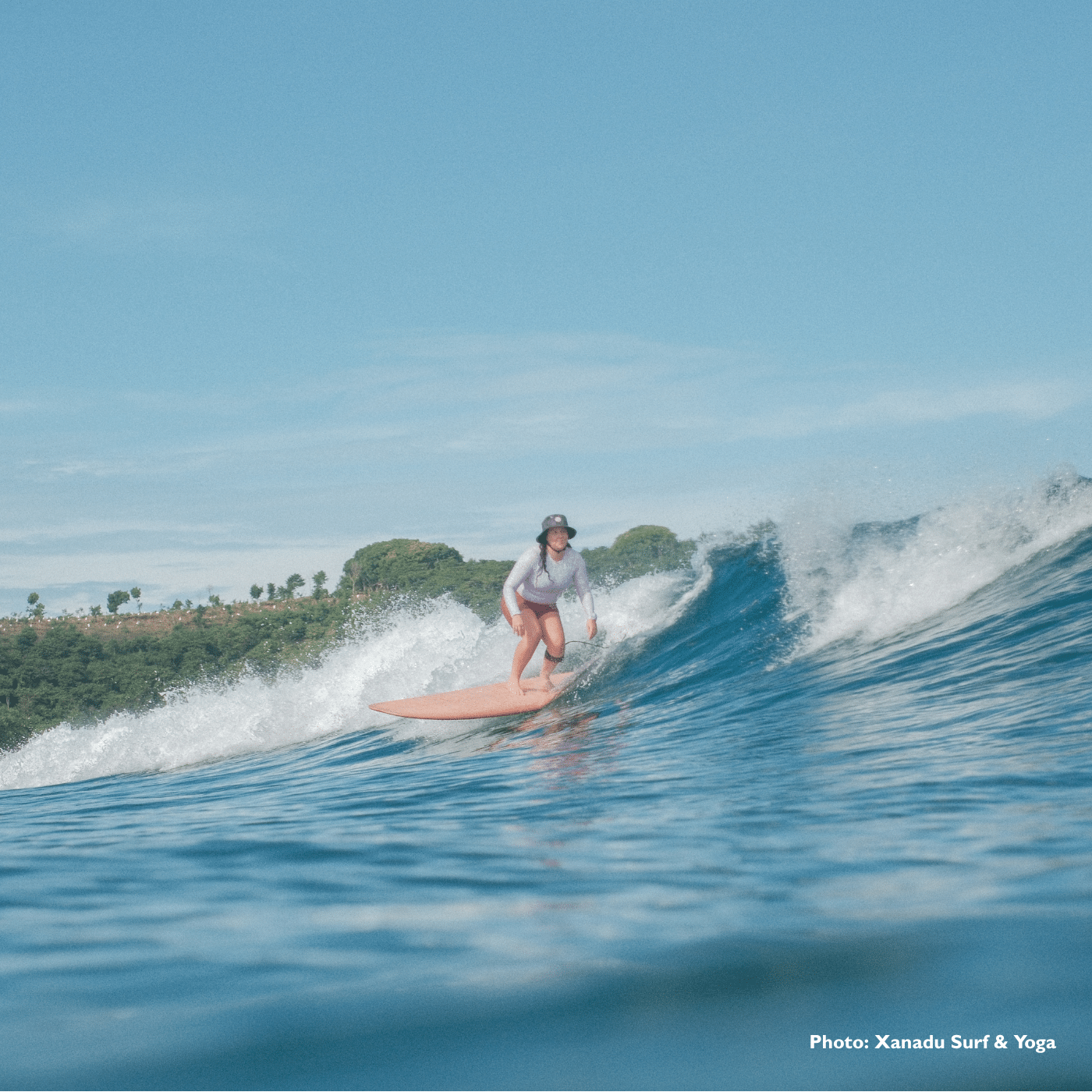 A surfer at Xanadu Surf & Yoga