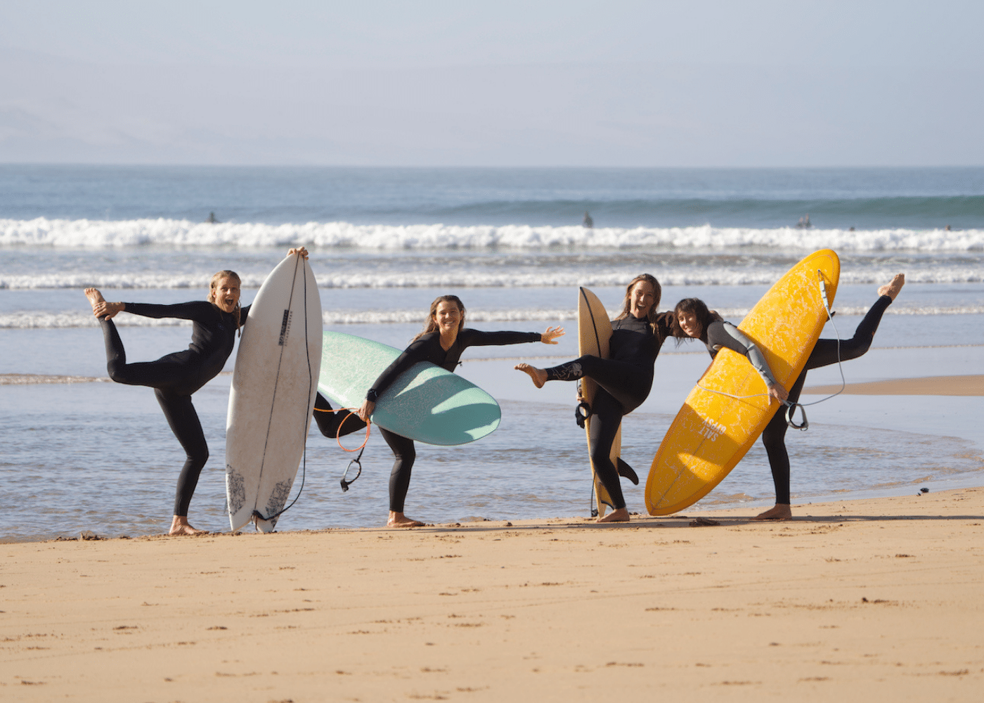Girls on a surf with amigas retreat