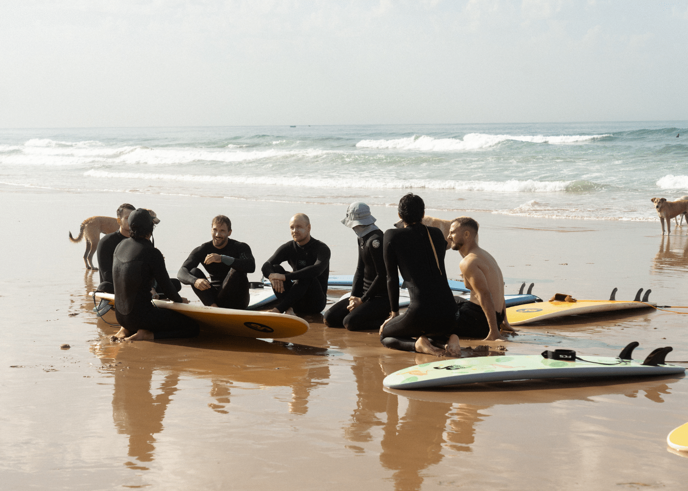 A group having a lesson on the beach whilst at Blue Mind Morocco