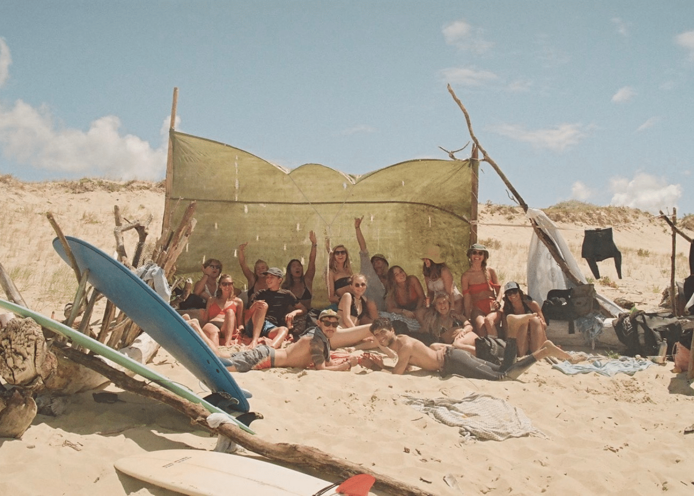 A surf group on the beach at Yume Surfcamps