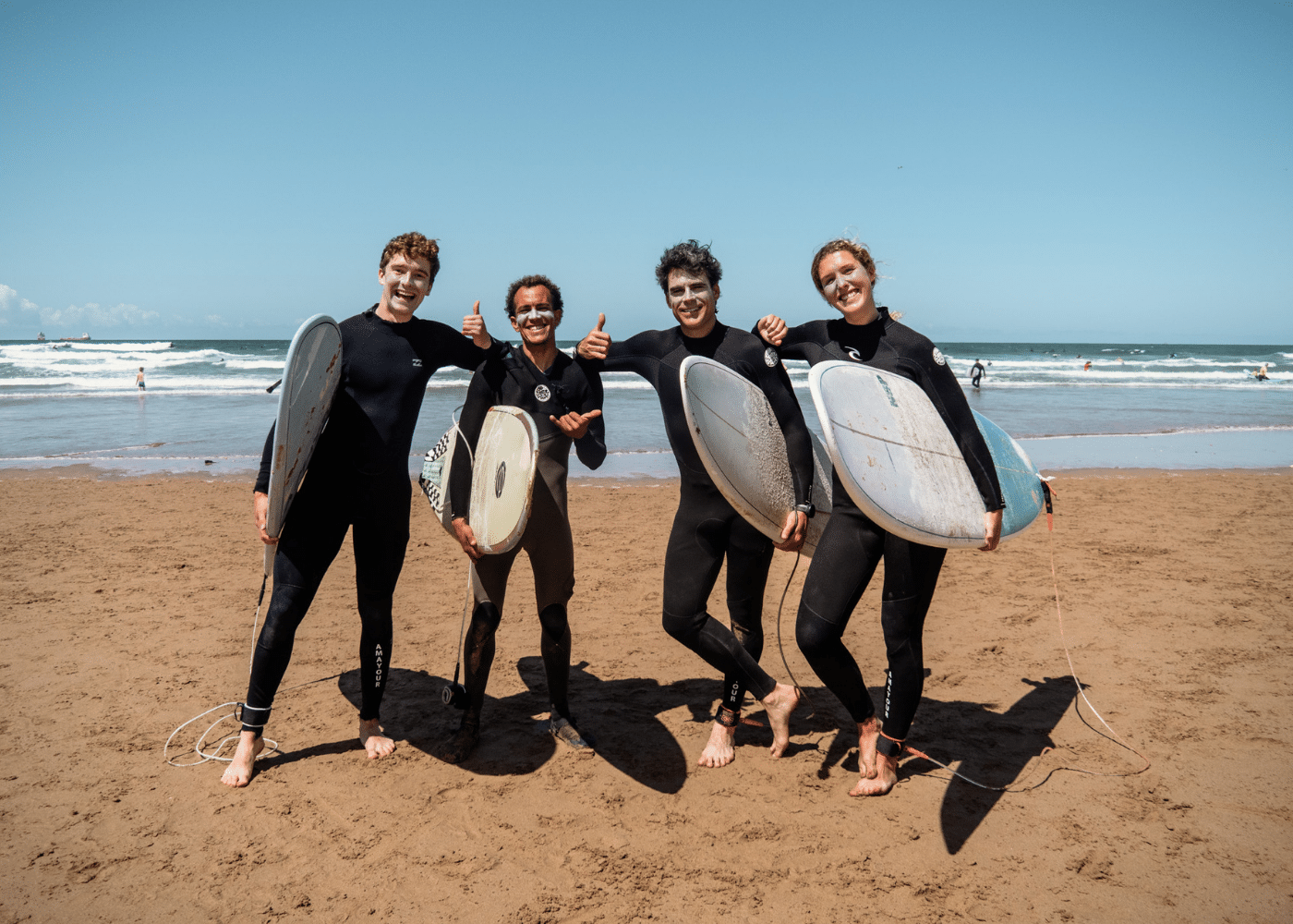 A surfing group at Amayour Surf & Yoga