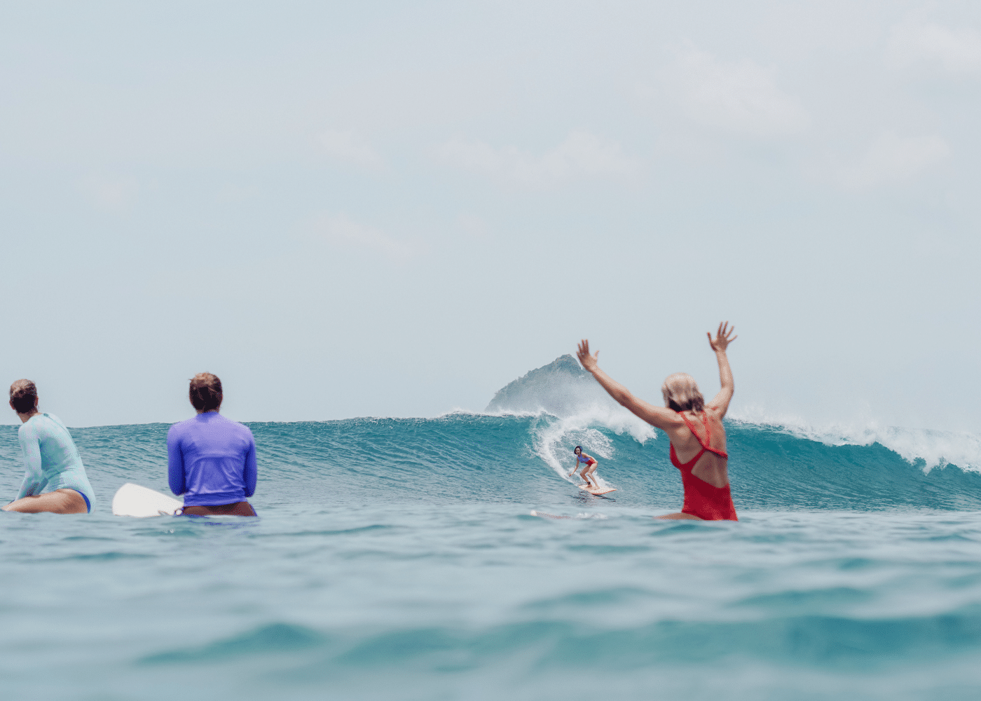 Surfing and celebrating the waves at Xanadu Surf & Yoga