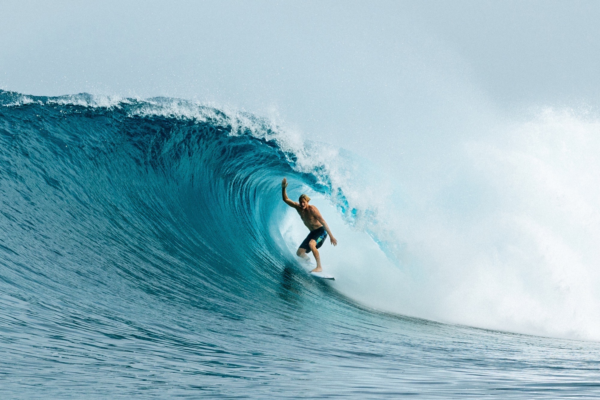 Surfer in a barrel